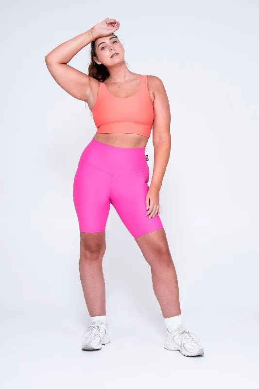 candy-pink-performance-panel-pocket-high-waisted-long-shorts