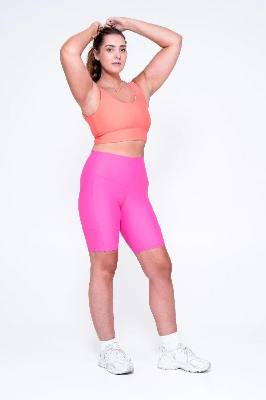 candy-pink-performance-panel-pocket-high-waisted-long-shorts